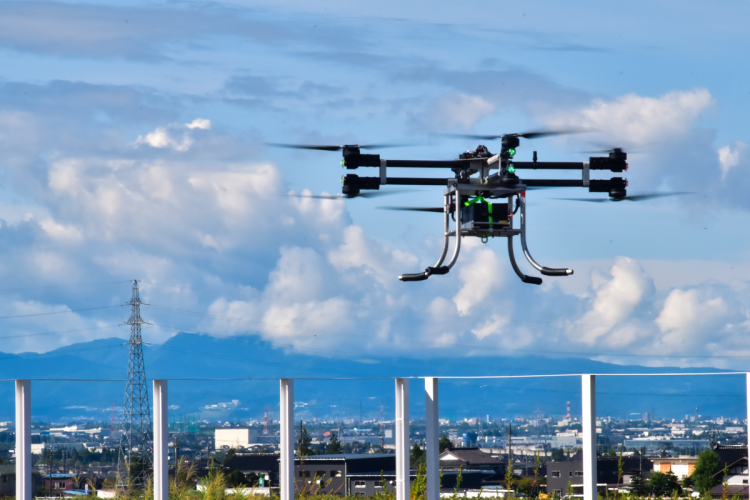 自社開発機重量物運搬大型ドローン